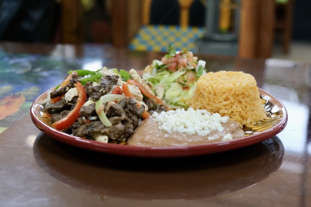 The restaurant serves authentic Mexican cuisine, such as the mixed fajita platter ($14.99). (Gracie Warhurst/Community Impact)