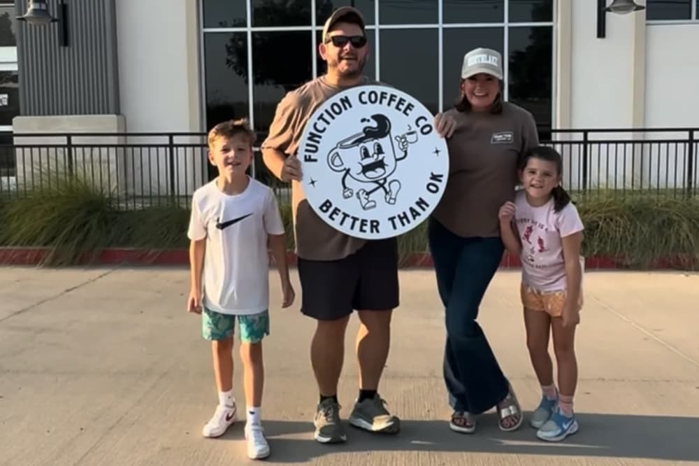 Founder Tony Daussat poses with his family in front of the new Northlake Function Coffee Co. building. (courtesy Function Coffee Co.)