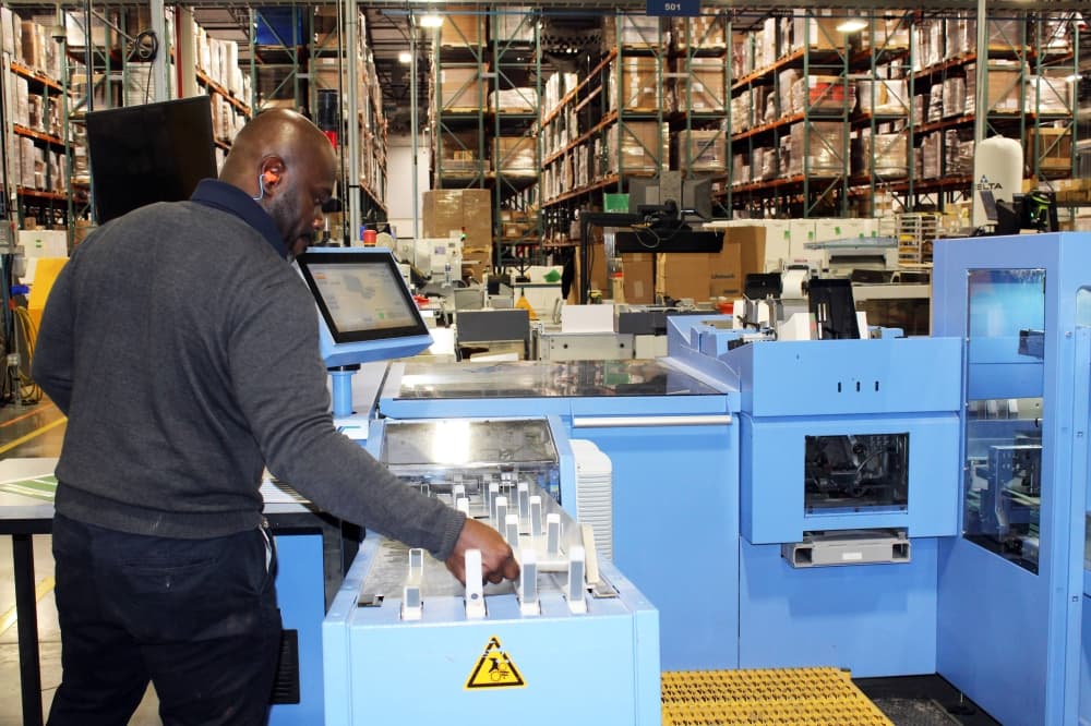 Male working in a manufacturing facility. 