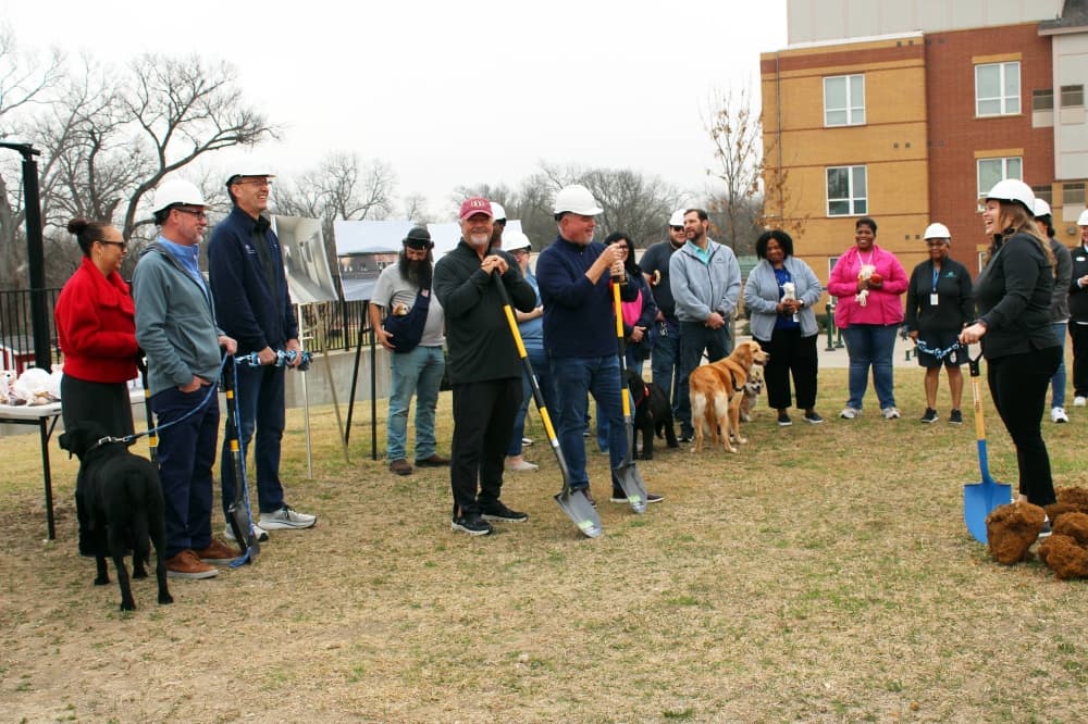 The Samaritan Inn CEO Jill Sciglian, far right, outlined services the expanded kennel will provide as well as a project timeline. (Karen Chaney/Community Impact)
