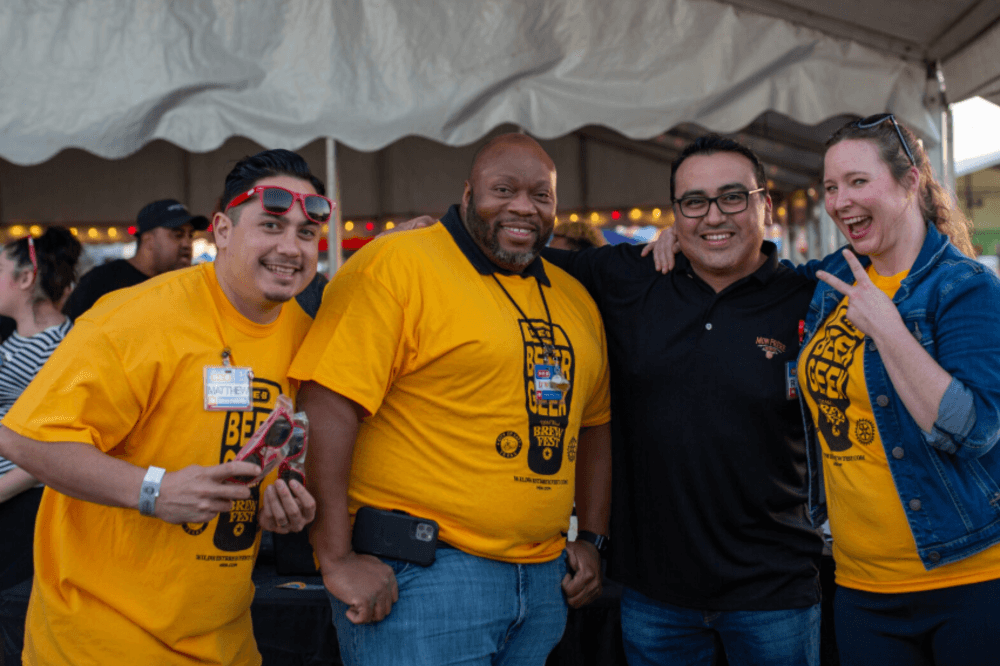 Festivalgoers enjoying live music and entertainment at Wild West Brewfest in Katy, Texas, a large outdoor craft beer festival near Houston known for live bands, local food vendors and hundreds of beer tastings.
