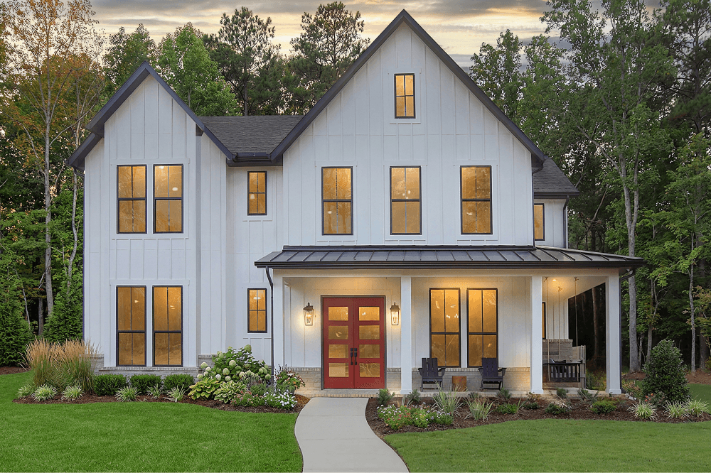 Exterior of a Drees Custom Home at Two Step Farm featuring classic architecture, landscaped yard, and spacious lot in a Montgomery master-planned community.