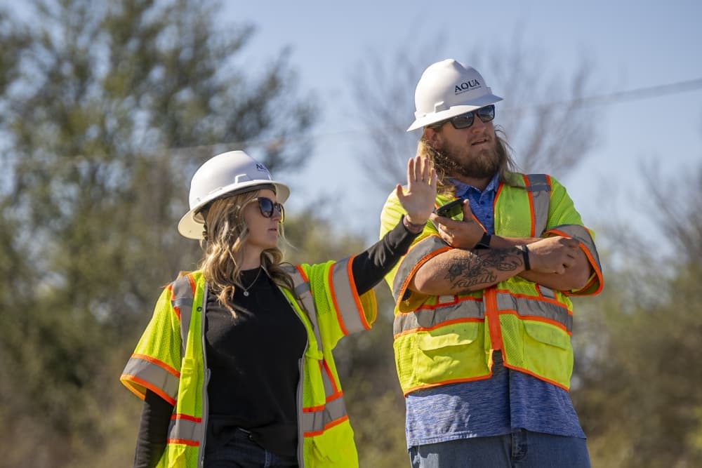 Aqua Water Supply employees working
