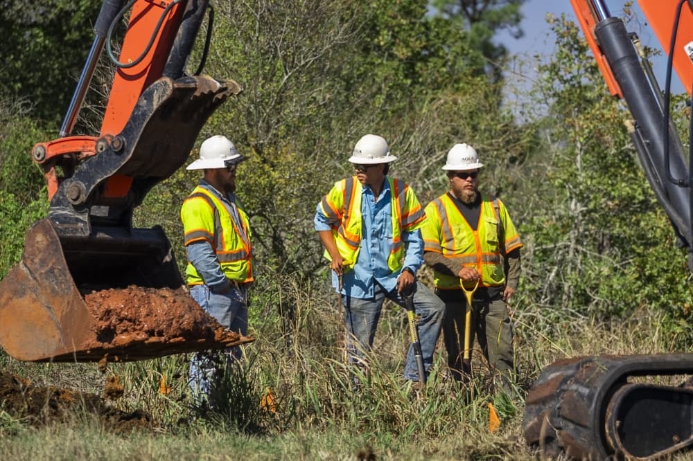 Aqua Water Supply employees working