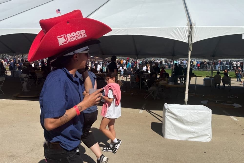 Fan walking at AT&T Stadium 