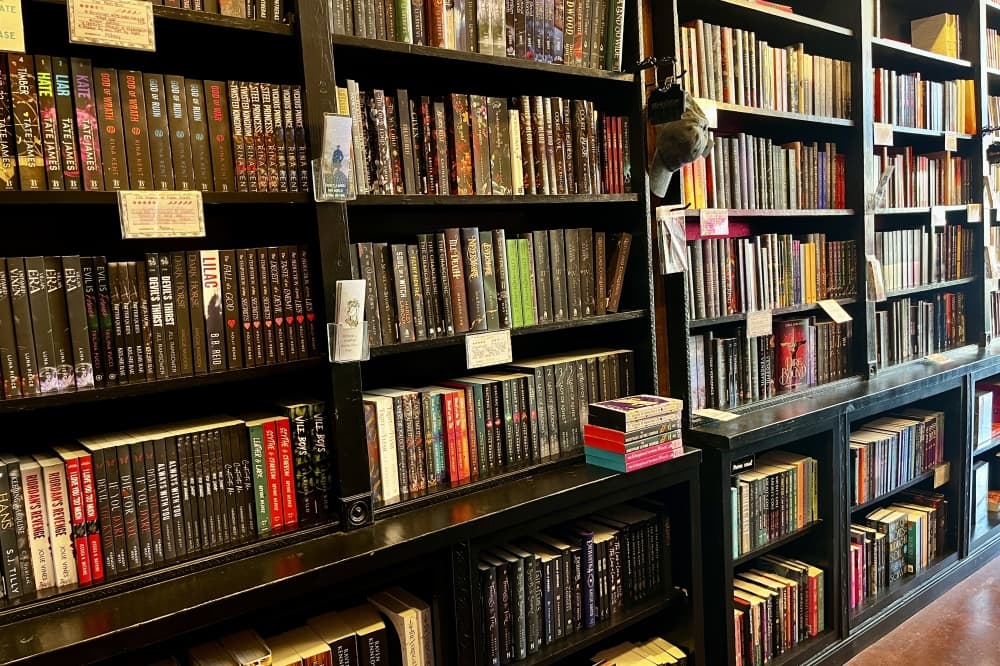 Some of the romance categories the bookstore carries include contemporary fiction, historical fiction, fantasy and sports. (Gabby Bailey/Community Impact)