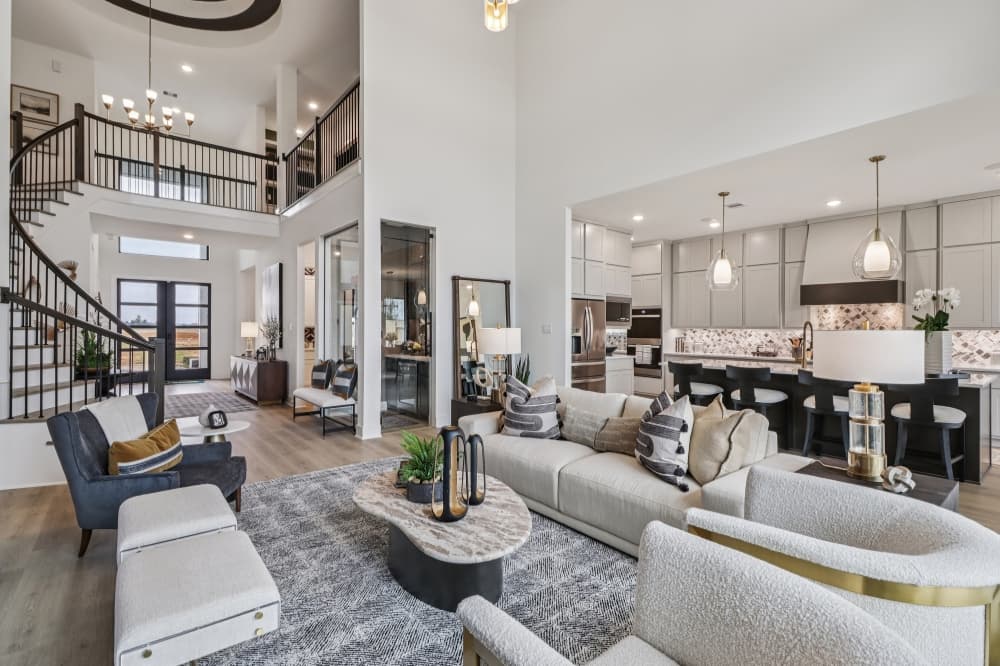 Interior of a Drees Custom Home in Everly featuring a gourmet kitchen, open floor plan, and natural light-filled living space ideal for family living.
