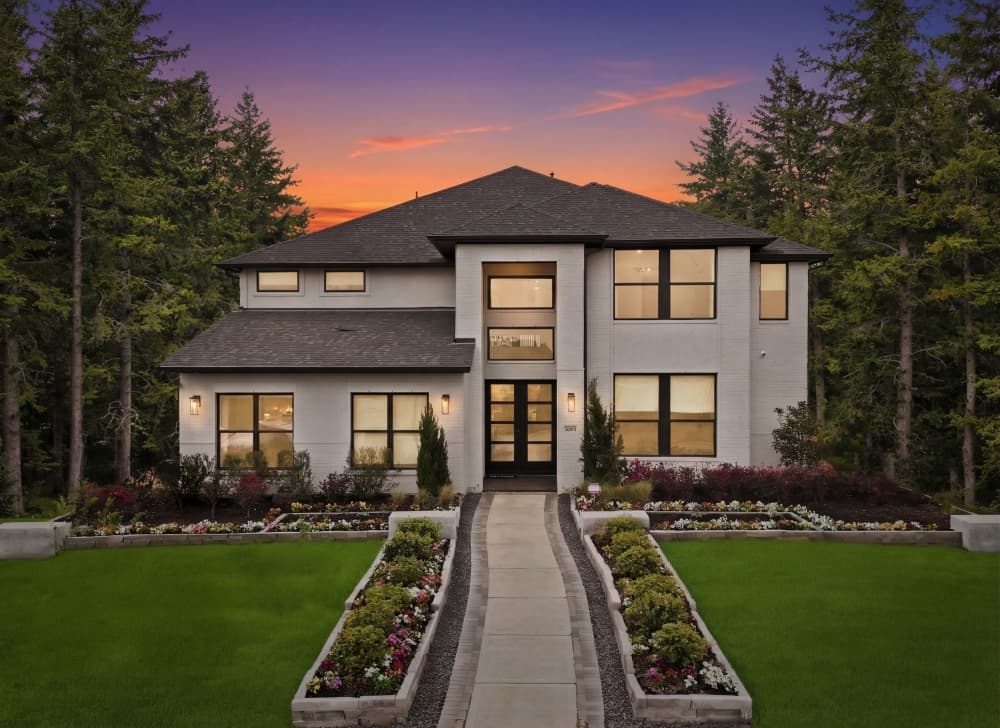 Exterior of a Drees Custom Home in Everly, Hockley, showcasing a spacious 60-foot lot with modern architecture and landscaped yard.