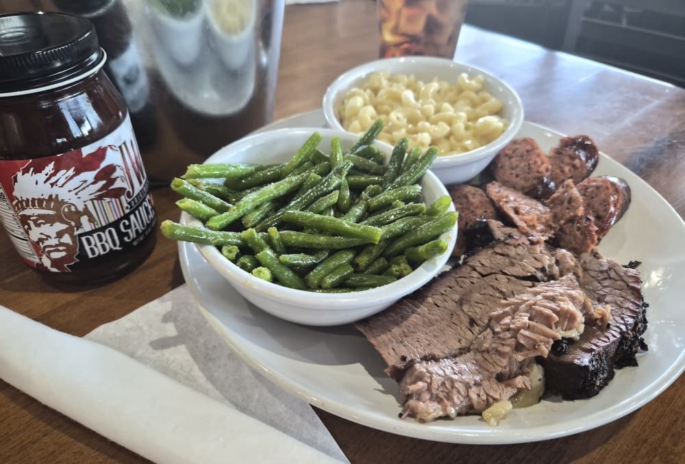 An HD plate at Harold Dean's Smoked Goods comes with two sides and two meats. (Patricia Ortiz/Community Impact)