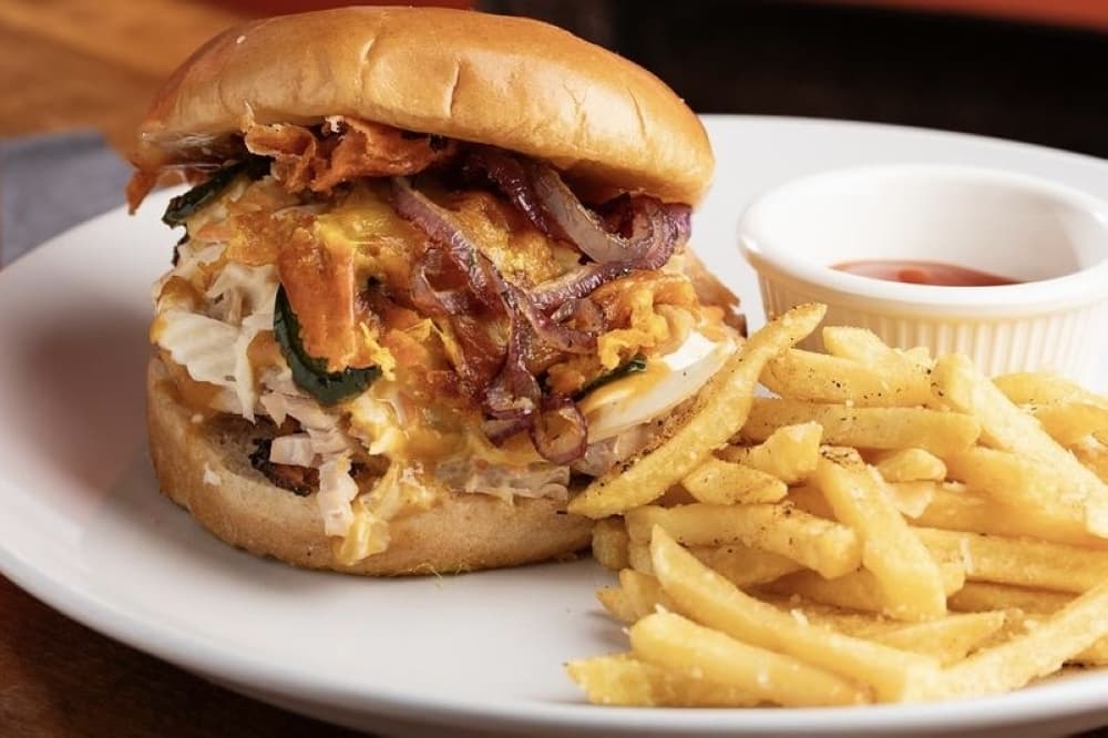 The JD Sandwich is made with a meat choice and comes with a side of fries. (Courtesy Harold Dean Smoked Goods)