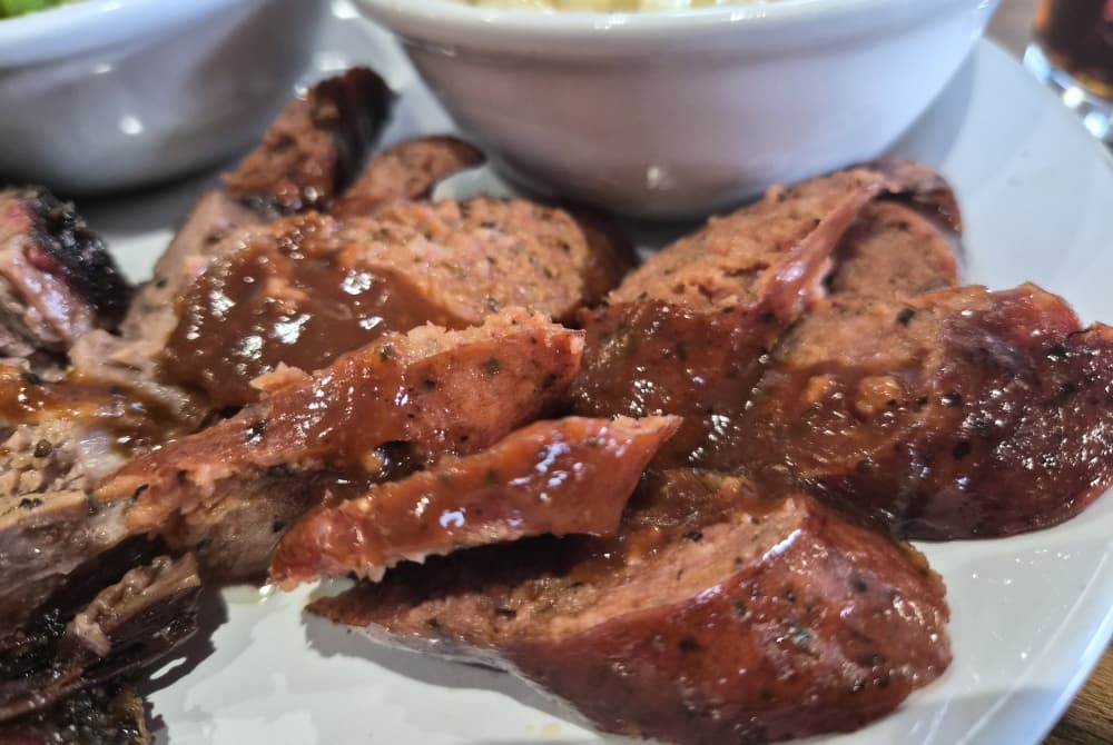 Harold Dean Smoked Goods is adding a new sausage option in celebration of its three-year anniversary. Currently, it offers a black pepper option. (Patricia Ortiz/Community Impact)