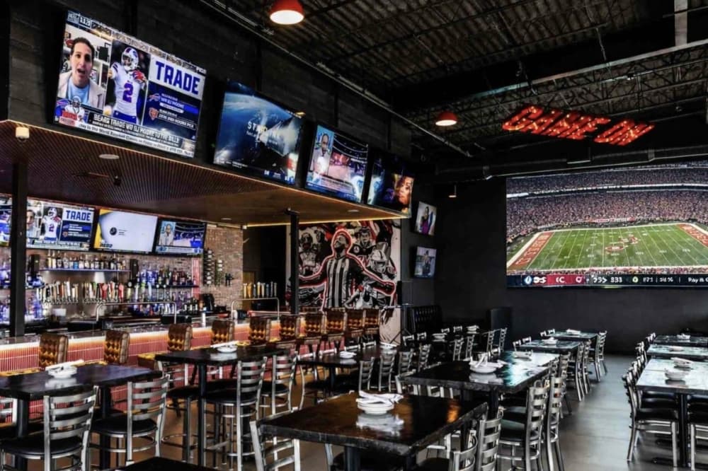 The new sports bar features a 16-by-9-foot LED TV that will show a variety of sporting events, including football, basketball, soccer, volleyball, tennis and cricket. (Courtesy Game On Bar & Grill)