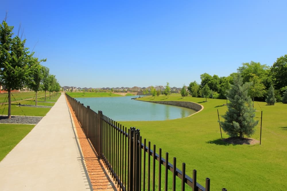 The Parks at Wilson Creek sidewalk with water view