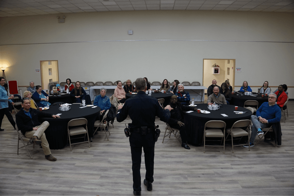 Tomball citizens participating in an informal dialogue with city leaders during a monthly Kaffeeklatsch session at the Tomball Community Center.
