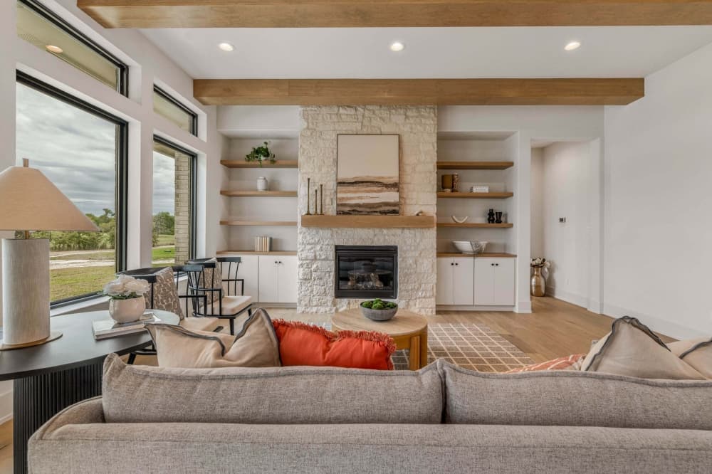 Living room with a couch and shelving