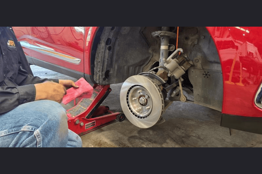 pflugerville mechanic working on car