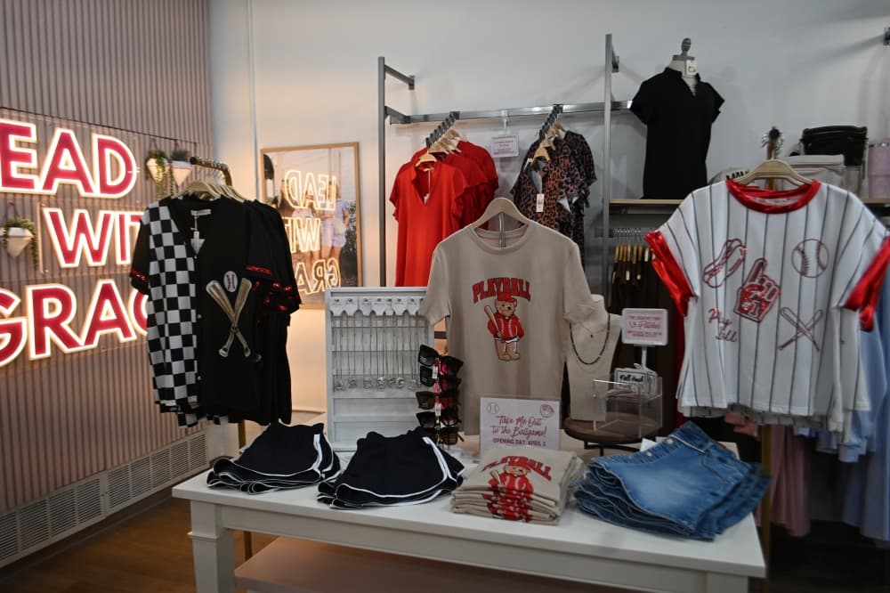 A seasonal clothing display inside Grace Emma.