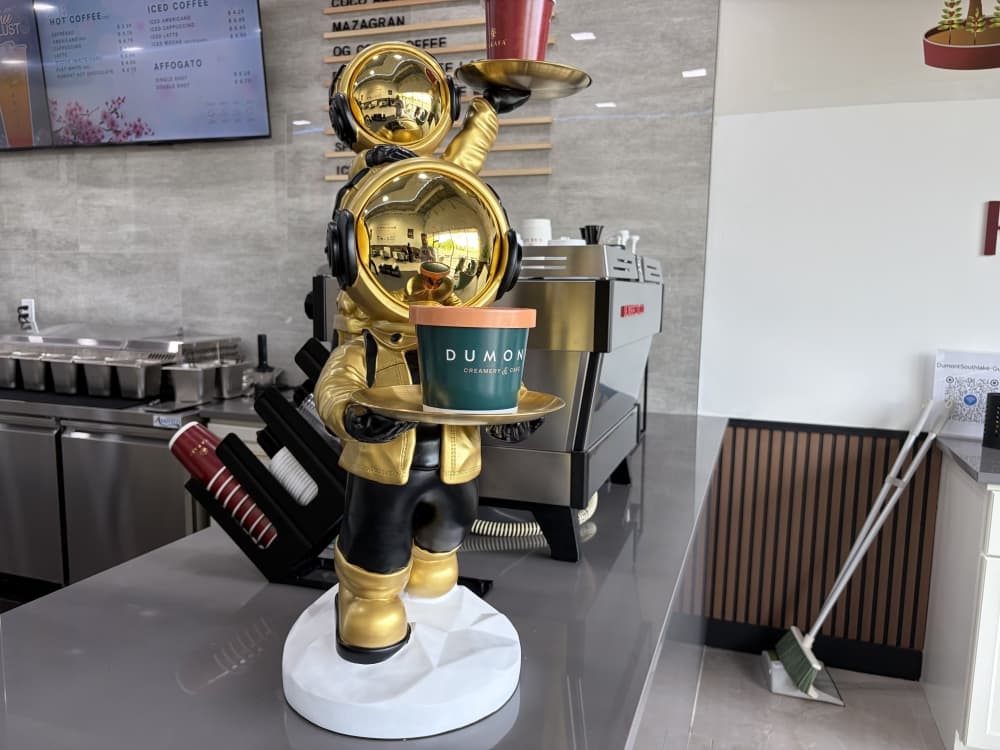 An astronaut sculpture sits inside Dumont Creamery in Southlake.