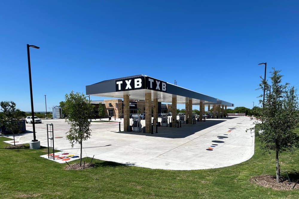 Gas station featuring TXB signage. 