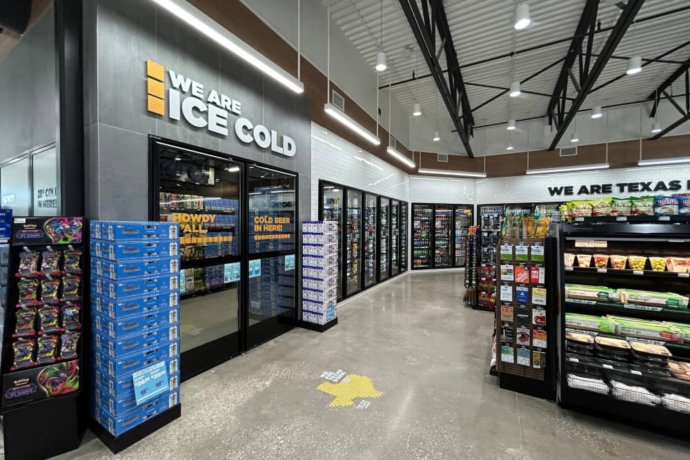 Convenience store with a walk-in beer cooler. 