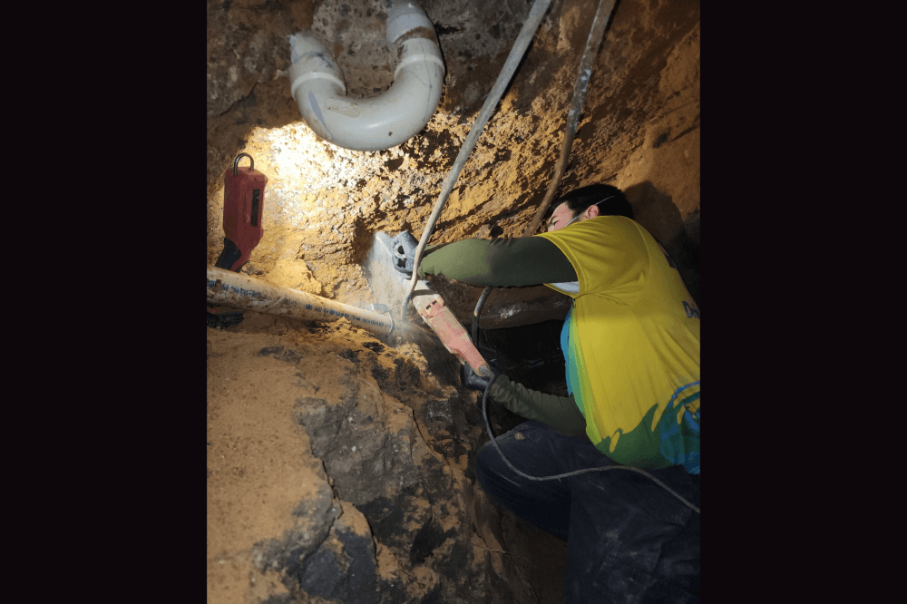 denton plumber working underground
