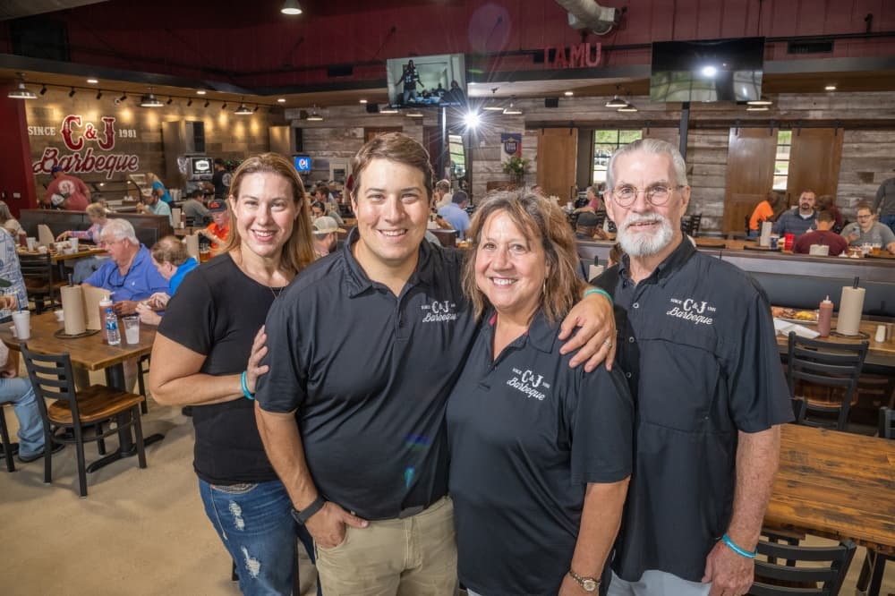 Reagan (left) and Justin Manning operate C&J Barbeque, which their parents, Jo and the late Chip Manning, started in 1981. (Courtesy C&J Barbeque)