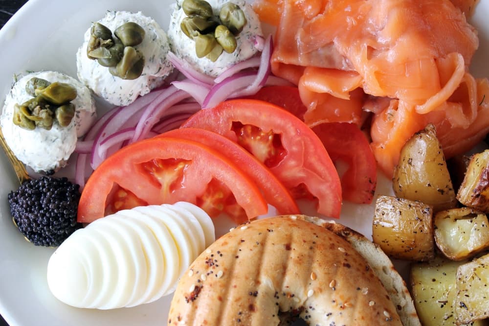 The restaurant has lox and bagels, an everything bagel with house-cured salmon, dill cream cheese, tomatoes, red onion, hard egg and caviar (Karen Chaney/Community Impact)