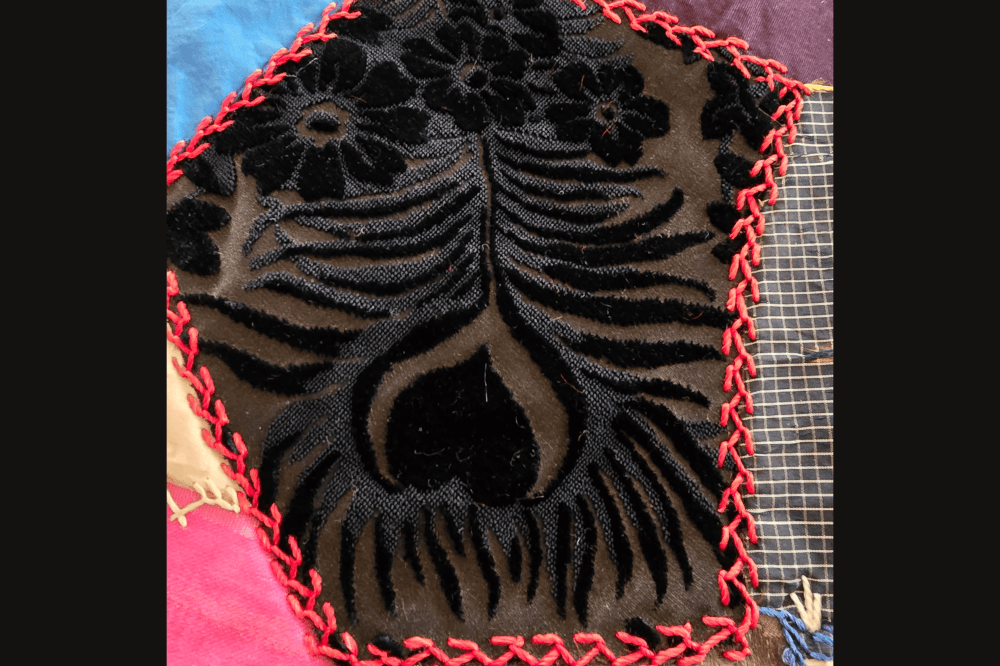 Crazy quilt with black mesh