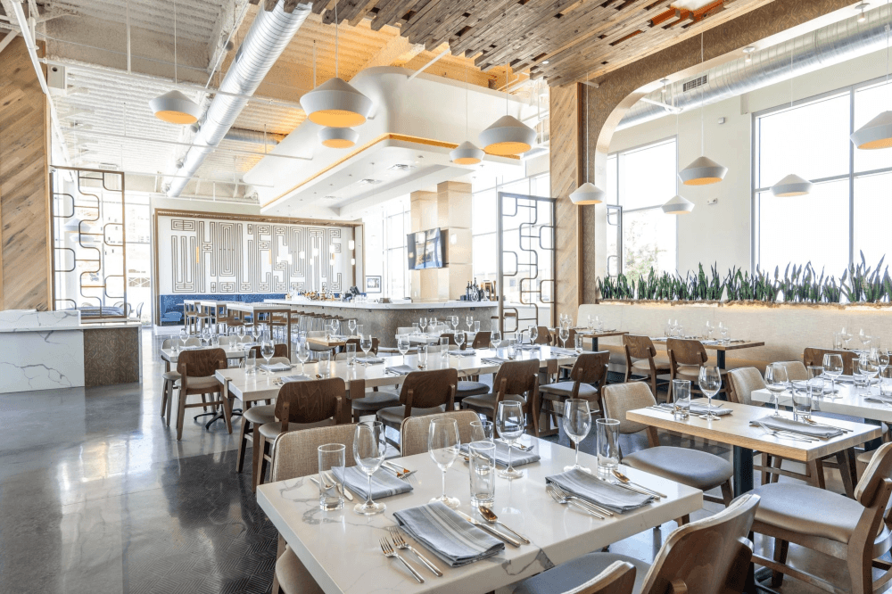 Interior of Bocca restaurant at Redemption Square in Generation Park Houston featuring upscale Italian dining atmosphere and modern design