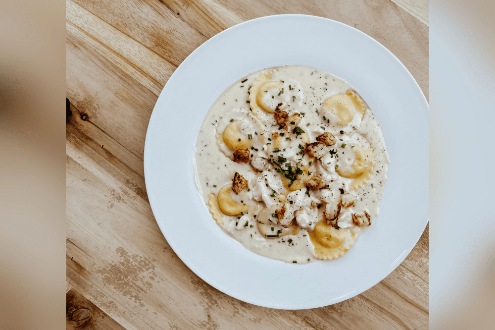 Plated Italian cuisine at Bocca restaurant in Generation Square Houston showcasing house-made pasta and seasonal chef-driven dishes