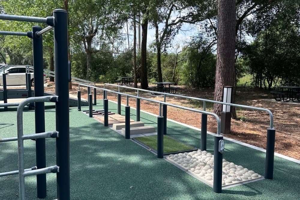 The mobility installation on the right allows community members to practice walking on differently textured surfaces. (Lizzy Spangler/Community Impact)