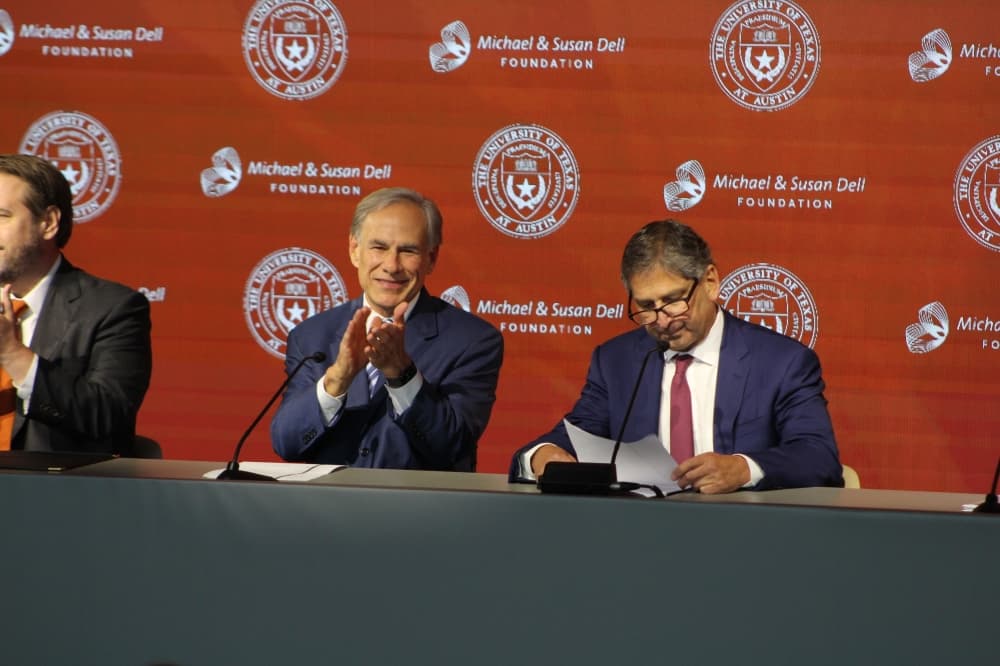 Gov. Greg Abbott and Kevin Eltife, chairman of the UT System Board of Regents