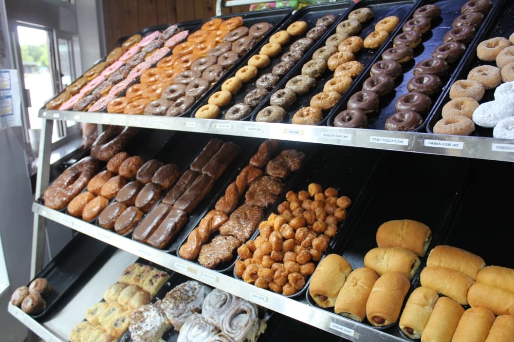 Round Rock Donuts best sellers include the classic glazed, chocolate covered and strawberry sprinkle. (Jillian Nachtigal/Community Impact)