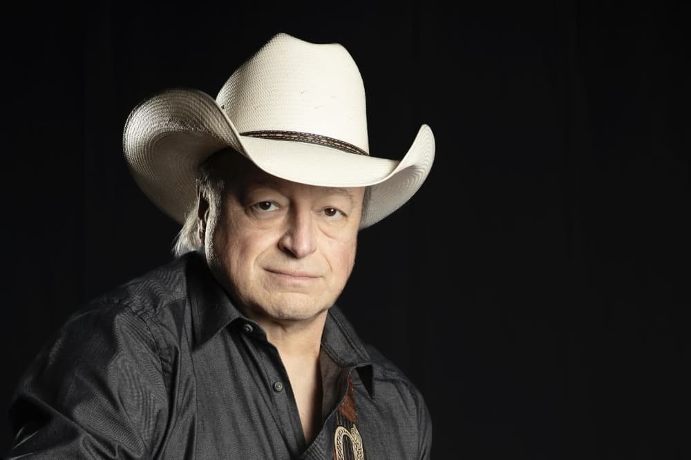 musician in cowboy hat