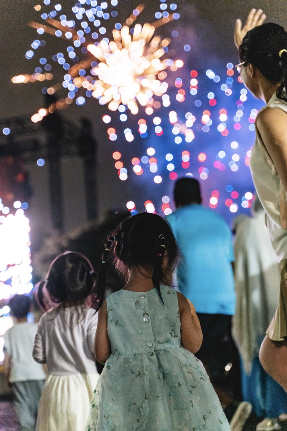 a girl watching fireworks