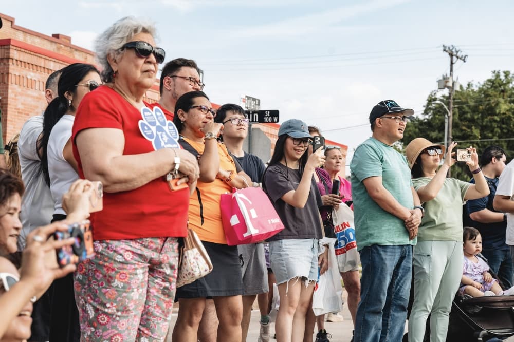 people watching a parade