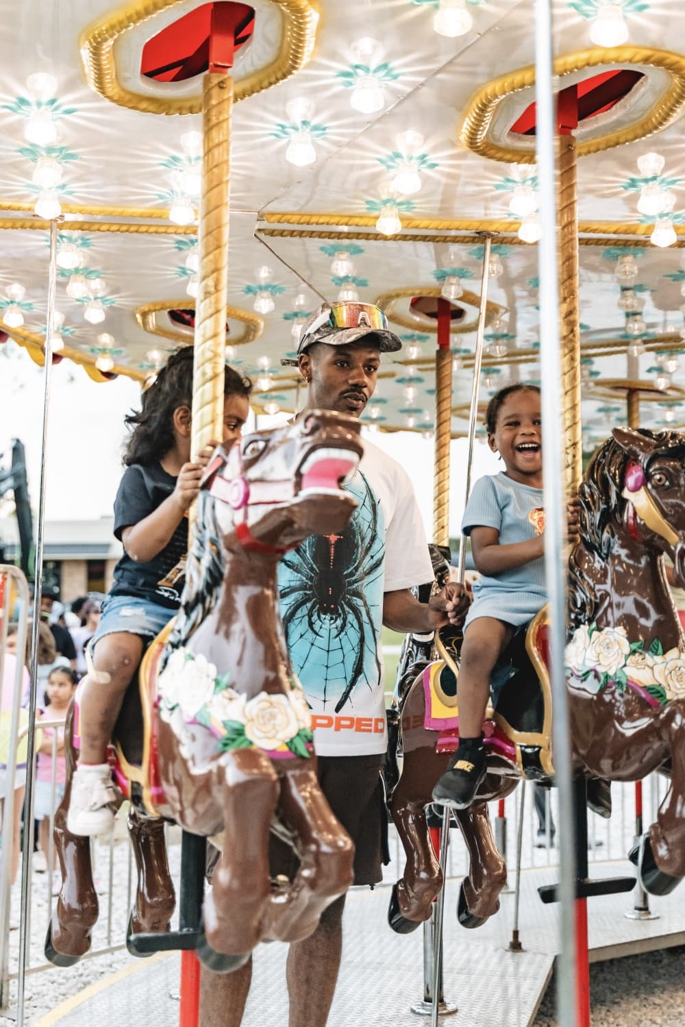 people on a merry go round 