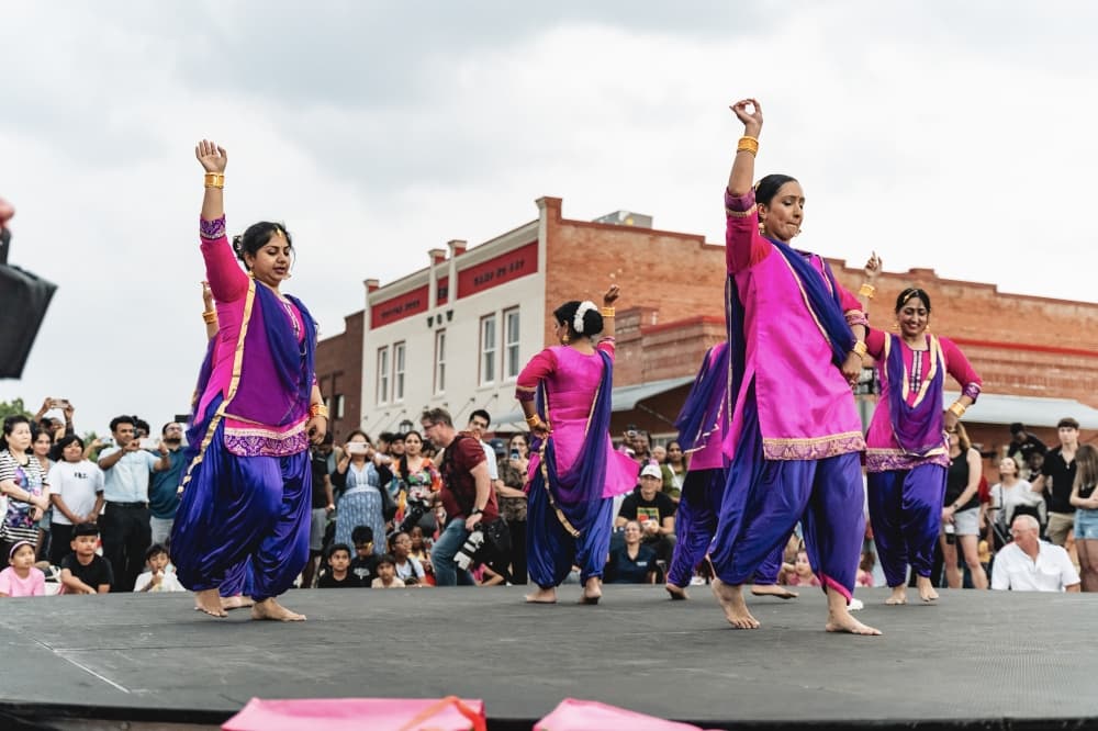 people dancing on a stage