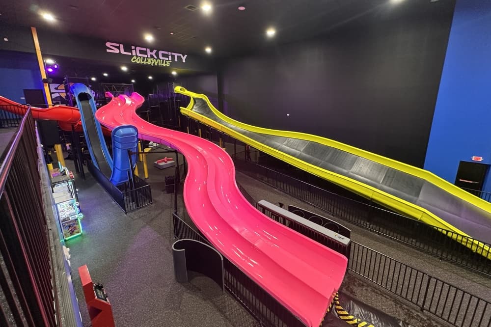 a pink, yellow and blue slide