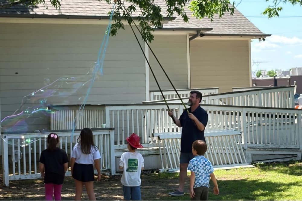 man with giant bubbles