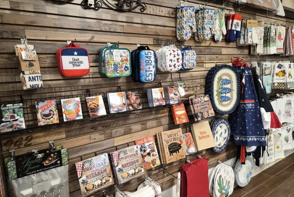 The souvenir shop offers a variety of items from oven mitts to table cloths.(Patricia Ortiz/Community Impact)