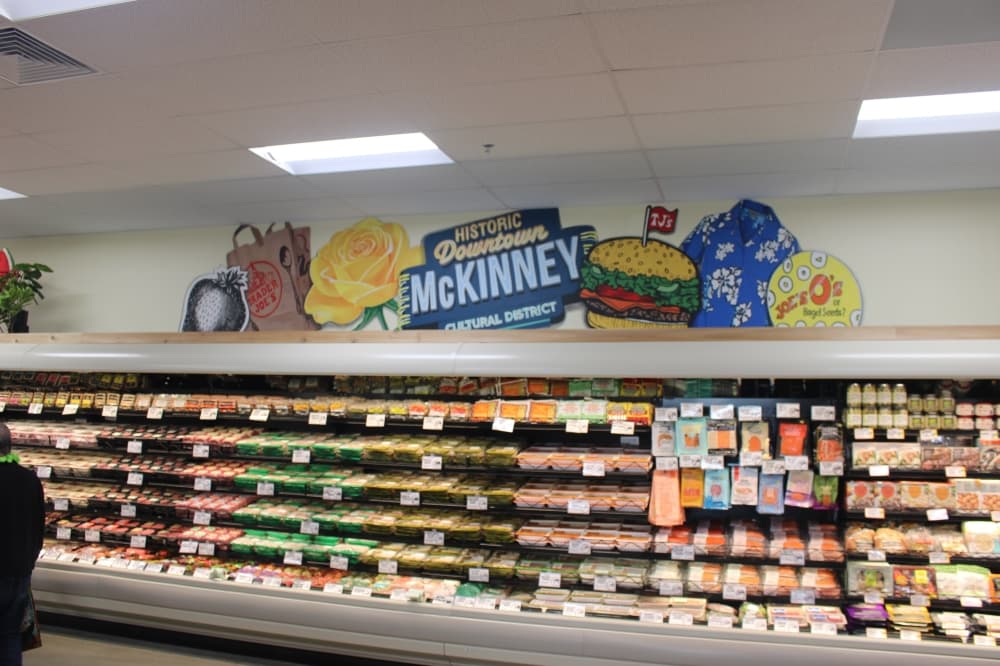 McKinney mural above food display