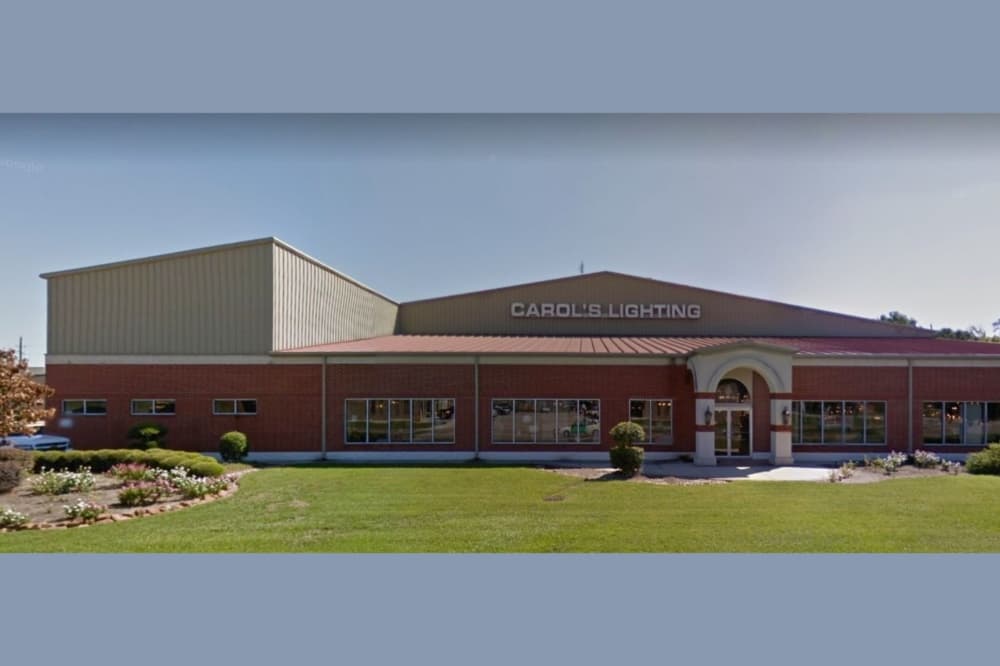 Exterior of Carol’s Lighting showroom in Humble, Texas, showcasing luxury lighting store storefront.