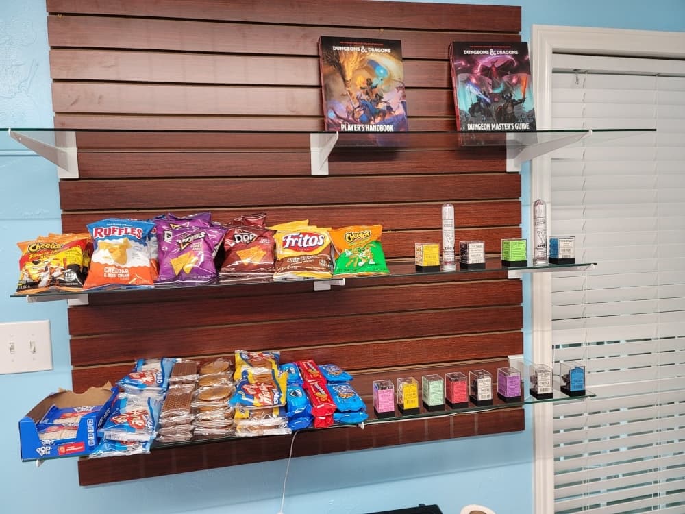 Shelves with snacks and products for sale at Blue Jay's Cauldron