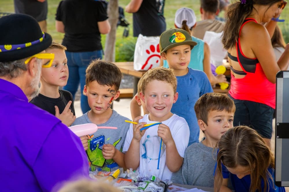 children laughing at an event