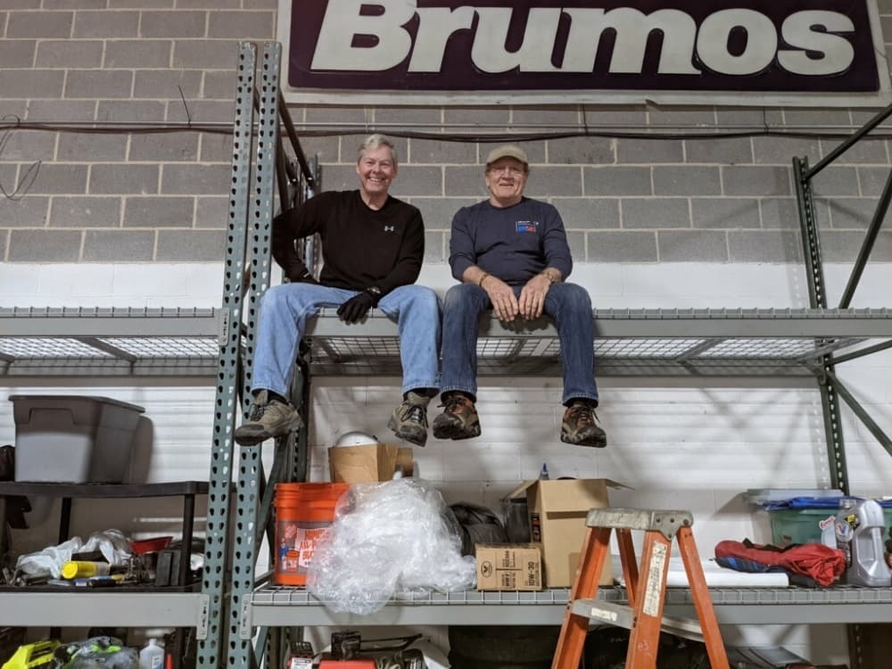people sitting on a shelf