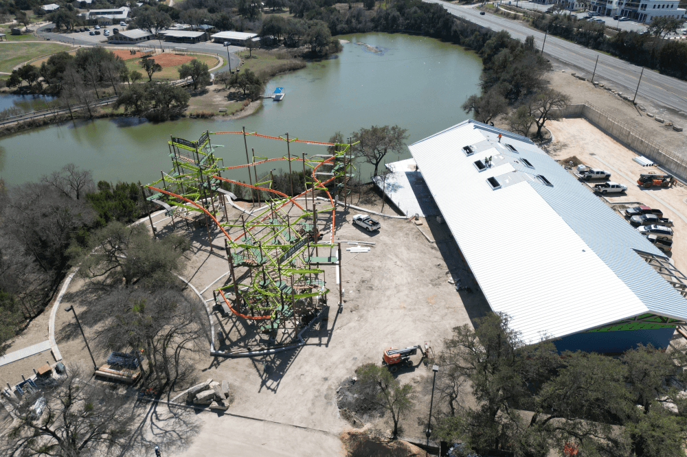 drone photo of ropes course and pavilion