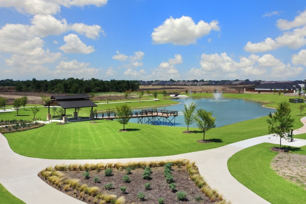 Residents enjoying walking trails and outdoor amenities at Elevon in Lavon Texas master-planned community