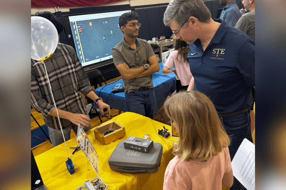 Houston STEM students learning coding, artificial intelligence and robotics technology in classroom setting