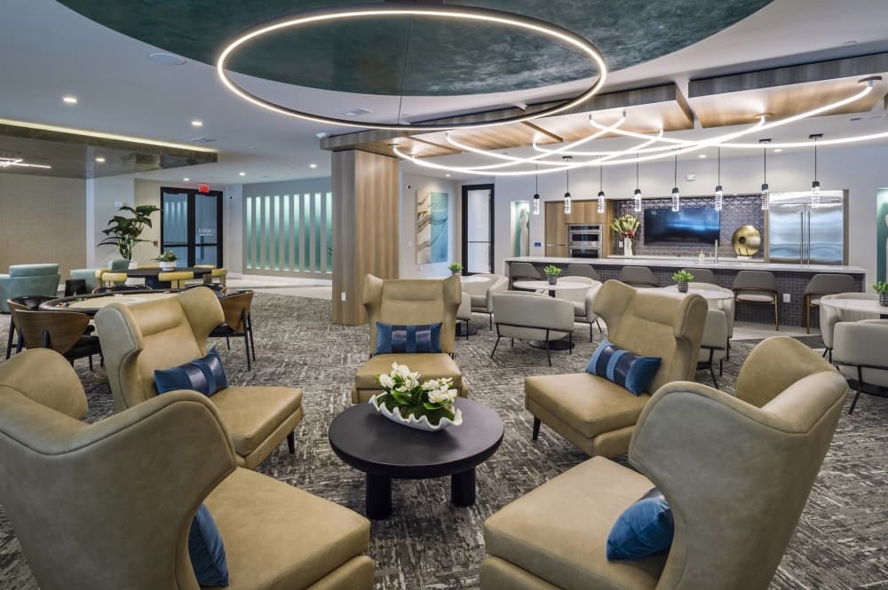 The resident lounge at Boardwalk Square includes multiple gathering spaces, televisions and a gourmet coffee bar. (Courtesy Hugh Hargrave)